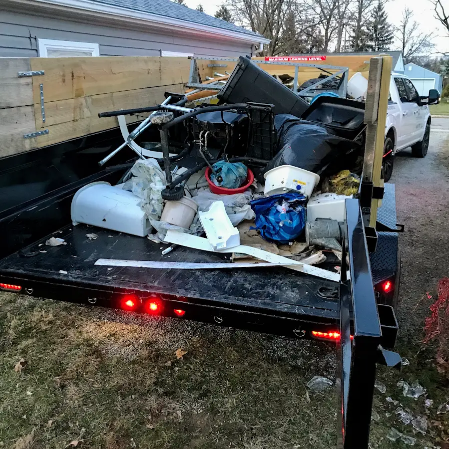 Roll-off dumpster delivered to a residential driveway in Ball Ground